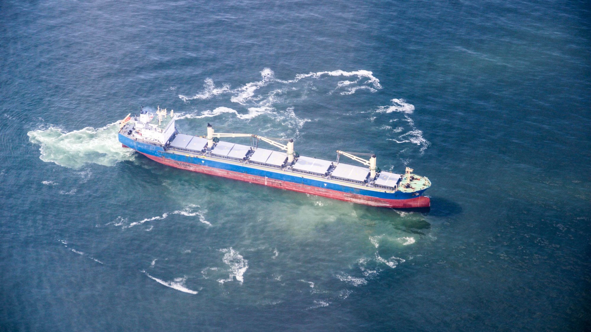 Bulk carrier underway, aerial view